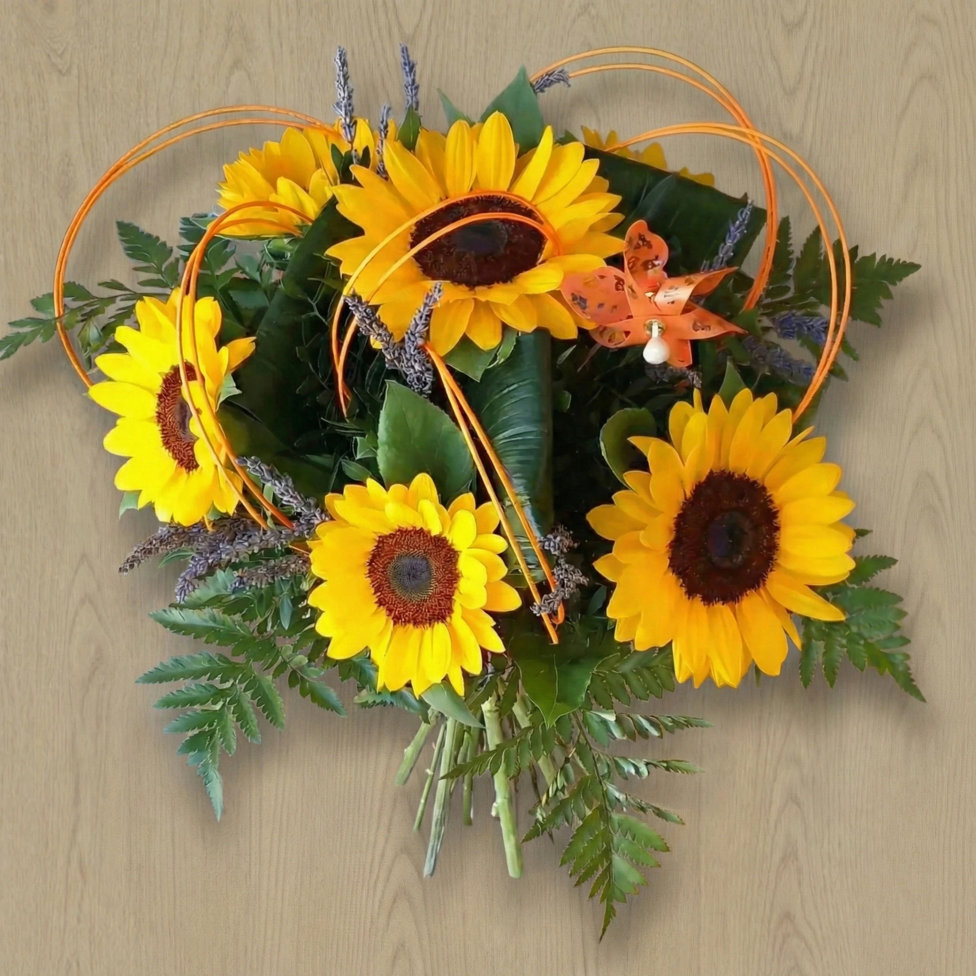 Bouquet bulle tournesols 38€