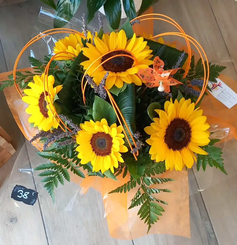 Bouquet bulle tournesols 38€